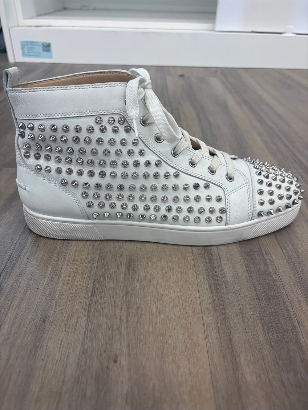 Christian Louboutin White High-Top Studded Leather Sneaker